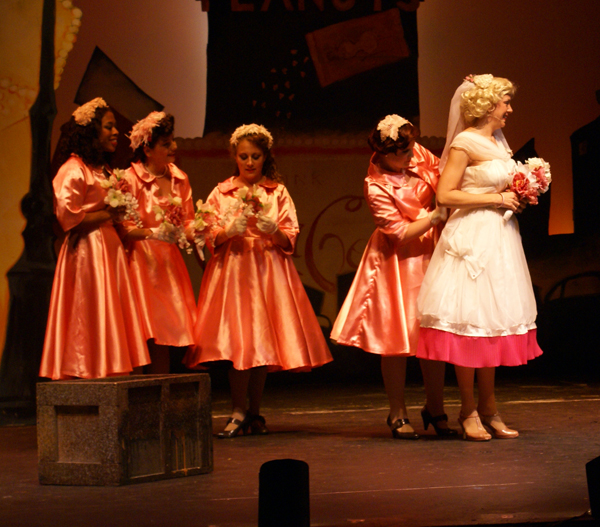 The Hot Box dancers as bridesmaids and Adelaide as bride from Guys and Dolls, costume design by Katharine Tarkulich