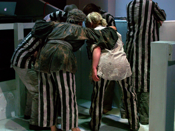 The discussion from The Cannibals, costume design by Katharine Tarkulich