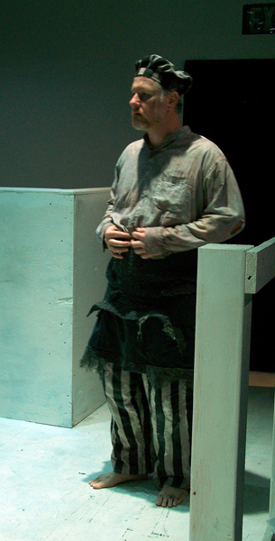 Weiss the cook from The Cannibals, costume design by Katharine Tarkulich