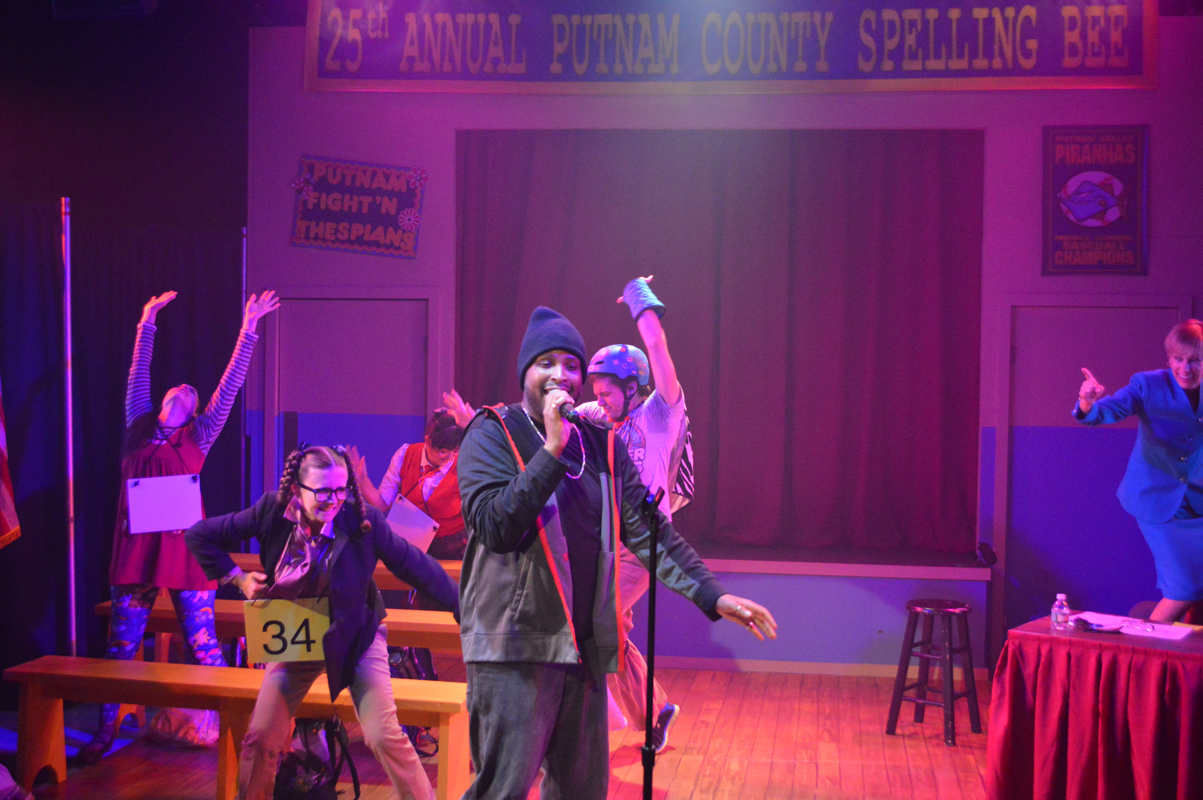 Mitch Mahoney and cast sing Life is Pandemonium in The 25th Annual Putnam County Spelling Bee, costume design by Katharine Tarkulich