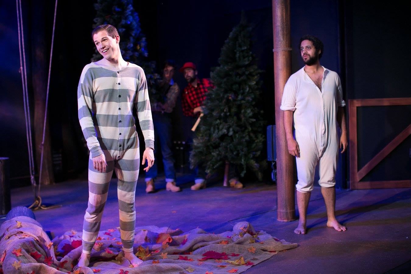 Demetrius and Lysander with Puck and Oberon watching from Shakespeare's A Midsummer Night's Dream costume design by Katharine Tarkulich